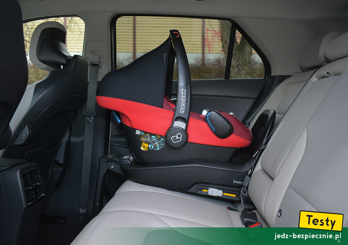 Testy - Kia Niro II EV - montaż fotelika dziecięcego, baza Isofix, grupa 0/0+, kanapa, tyłem do kierunku jazdy