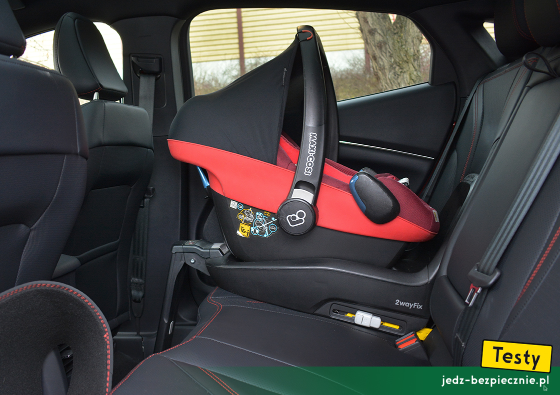 Testy - Ford Mustang Mach-E AWD - montaż fotelika dziecięcego, baza Isofix, grupa 0/0+, kanapa, tyłem do kierunku jazdy