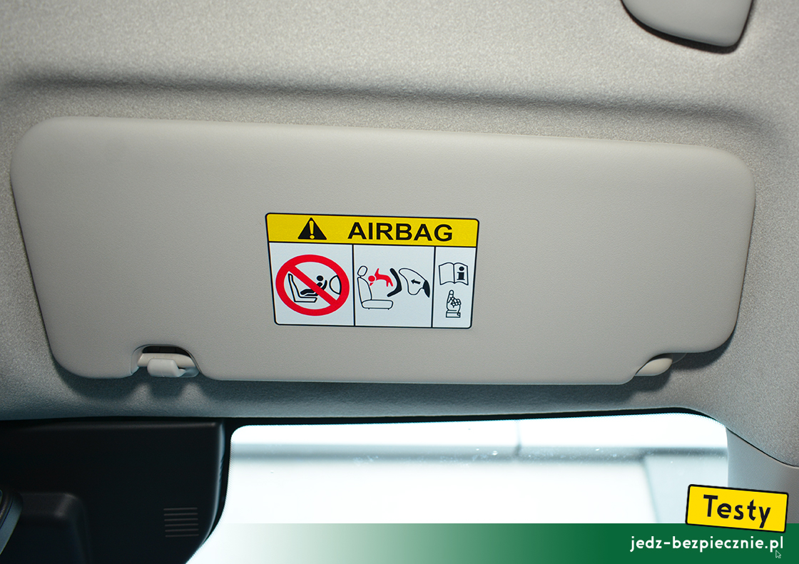 Testy - Kia Niro II EV - osłona przeciwsłoneczna pasażera, ostrzeżenie, fotelik dziecięcy, tyłem do kierunku jazdy, aktywna poduszka powietrzna
